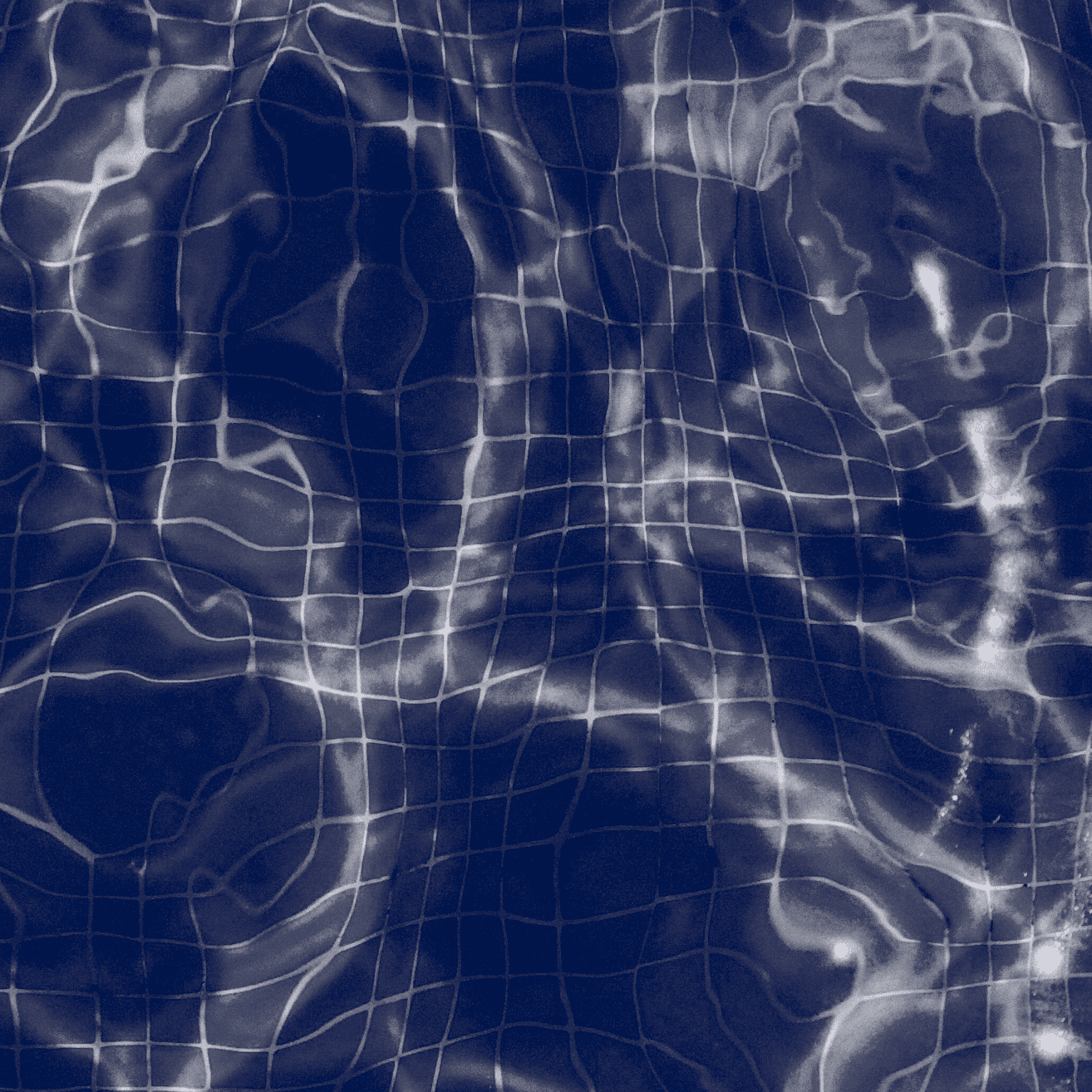 A picture of the bottom of a swimming pool through the water